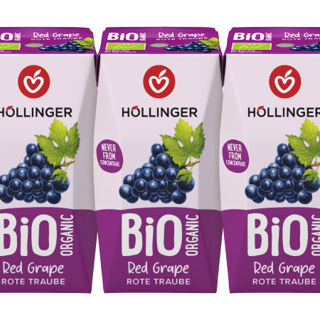Höllinger Bio Traube Schulsaft in der 200ml Packung auf der eine Rebe roter Trauben zu sehen ist.